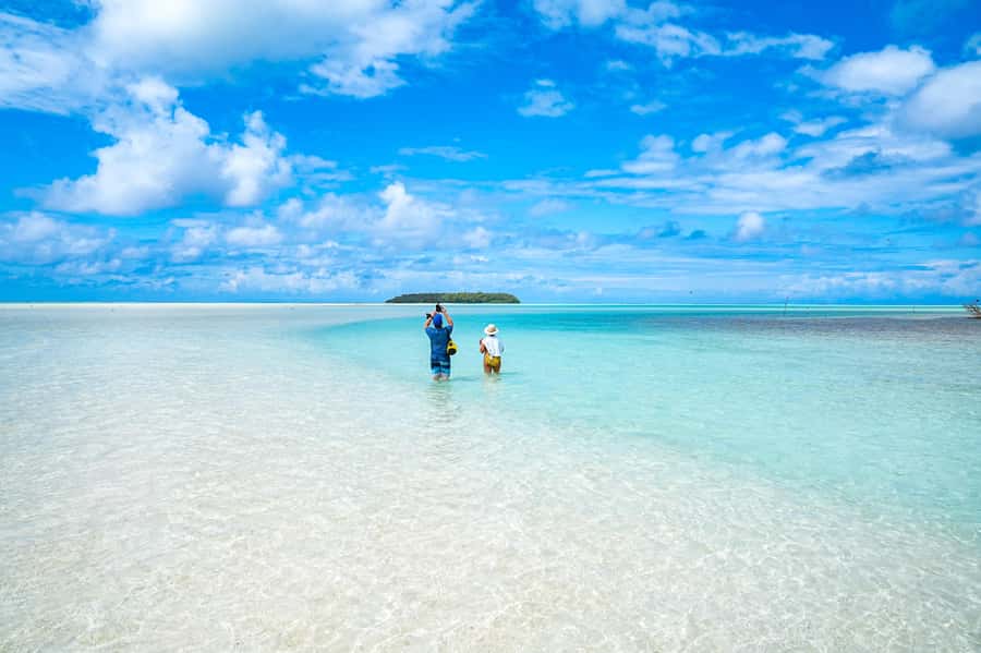 From Tahiti: Tetiaroa Island Tour by Sailing Catamaran - Landing on Tetiaroa by dinghy