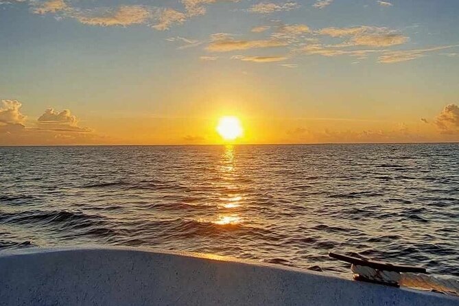 Guided sunset cruise on Raiatea Lagoon - Watching Raiatea change color after 5:00 pm