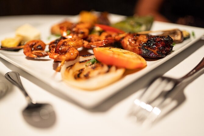 Luxury Private Sunset Cruise and Motu Dinner in Bora-Bora - A three-course meal with local flavors