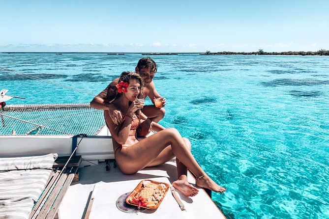 PRIVATE Half Day Tour : Moorea Snorkeling & Sailing on a Catamaran named Taboo - Snacks, fruit, juice, and alcoholic drinks