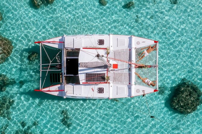 PRIVATE Sunset Tour: Moorea Snorkeling on a Catamaran named Taboo - Three snorkeling stops with sharks, rays, and an underwater tiki