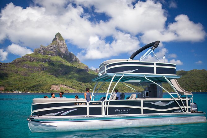 Toa Boat Bora Bora Private Lagoon tour with Lunch on Ambassador Boat - The slide, shower, and time between swims