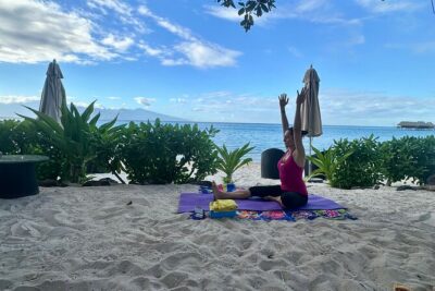 Yoga at sunrise at Sofitel Moorea, overlooking Tahiti
