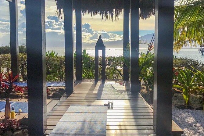Yoga at sunrise at Sofitel Moorea, overlooking Tahiti - Weather can change the plan